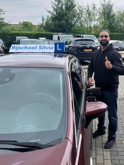 Michael is geslaagd voor het rijbewijs